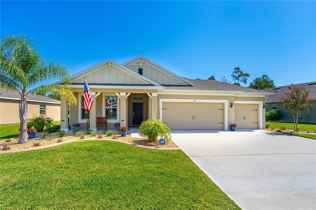 2901 Monaghan Dr, Ormond Beach, FL 32174 - view of front of house featuring a front lawn, a porch, concrete driveway, a garage, and board and batten siding