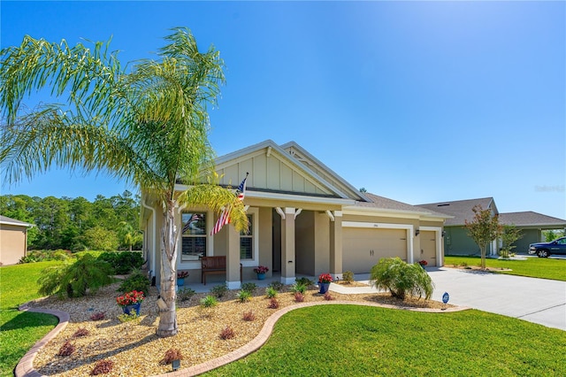 2901 Monaghan Dr, Ormond Beach, FL 32174 - view of front of property featuring an attached garage, driveway, a porch, and a front lawn