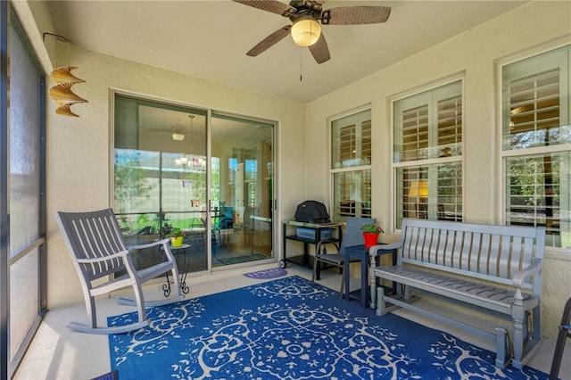2901 Monaghan Dr, Ormond Beach, FL 32174 - sunroom / solarium with a textured wall, plenty of natural light, and ceiling fan