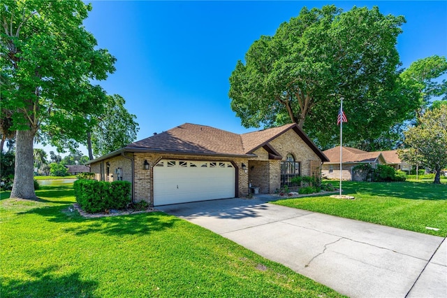 ranch-style home with brick siding, a garage, driveway, and a front yard