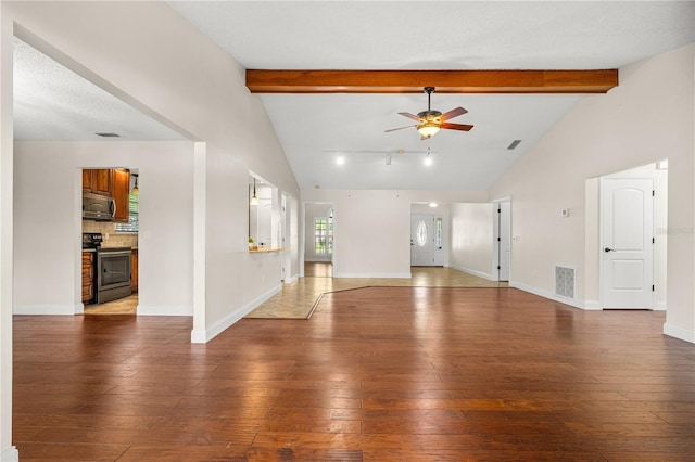 unfurnished living room with vaulted ceiling with beams, a ceiling fan, hardwood / wood-style flooring, and visible vents