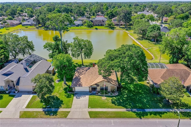 bird's eye view with a water view and a residential view