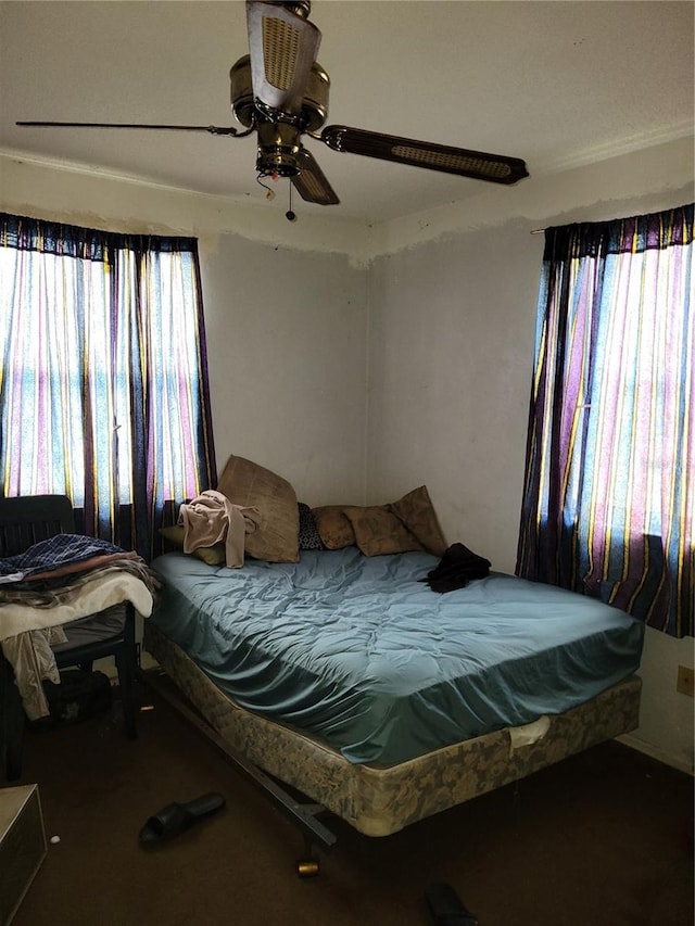 bedroom featuring ceiling fan