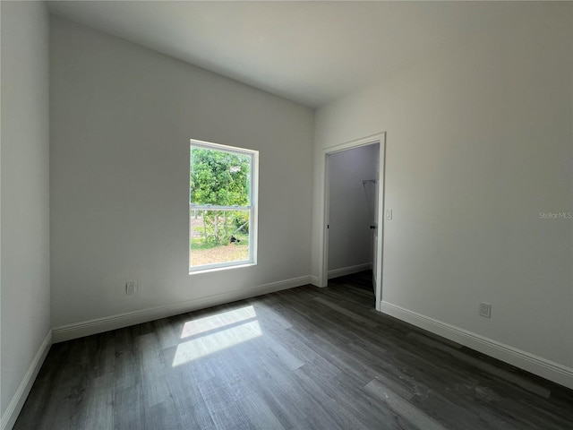 516 Model St, Daytona Beach, FL 32114 - spare room featuring dark wood finished floors