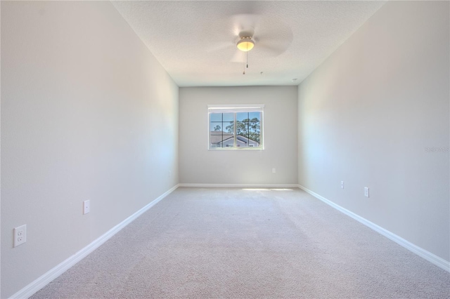 258 Rustic Loop, Sanford, FL 32771 - empty room with ceiling fan, baseboards, a textured ceiling, and carpet