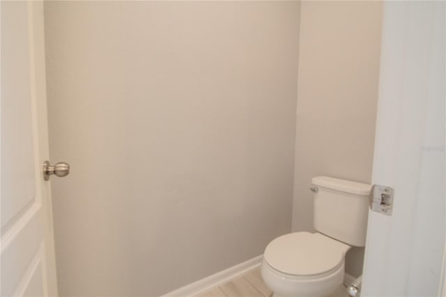 258 Rustic Loop, Sanford, FL 32771 - bathroom featuring toilet and baseboards