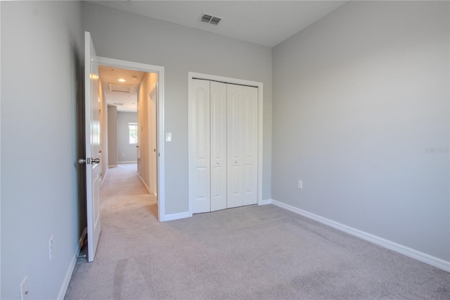 258 Rustic Loop, Sanford, FL 32771 - unfurnished bedroom with baseboards, visible vents, carpet floors, and a closet