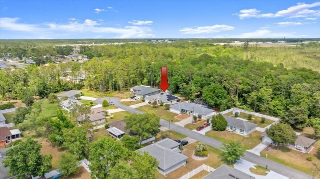 10 Zebrawood Ct, Palm Coast, FL 32164 - birds eye view of property featuring a forest view and a residential view