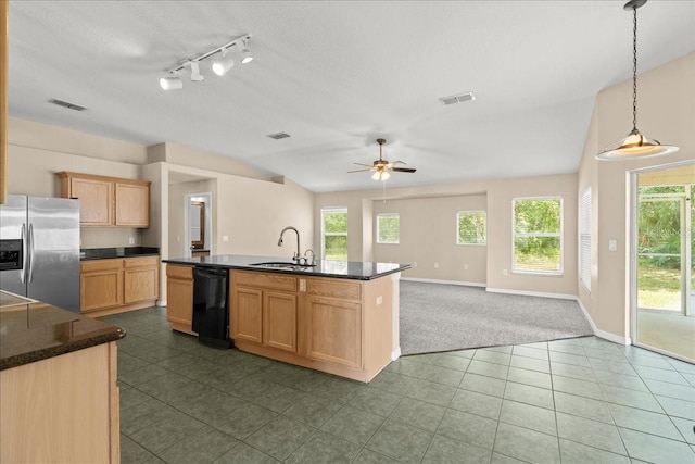 10 Zebrawood Ct, Palm Coast, FL 32164 - kitchen featuring stainless steel refrigerator with ice dispenser, visible vents, light brown cabinetry, a sink, and black dishwasher