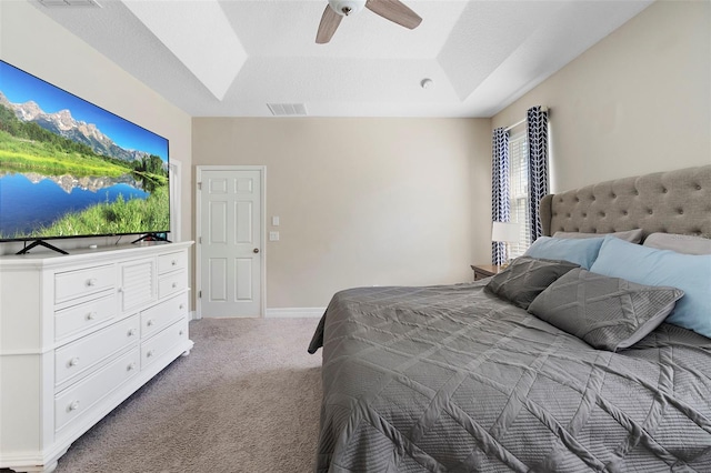 2337 Oxmoor Dr, Deland, FL 32724 - carpeted bedroom with a raised ceiling and a ceiling fan