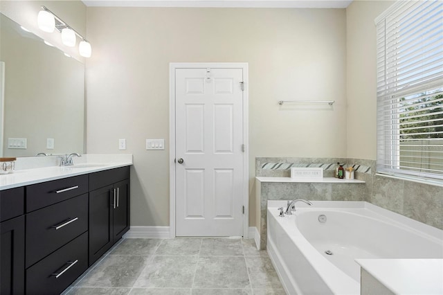 2337 Oxmoor Dr, Deland, FL 32724 - bathroom with vanity, a garden tub, and baseboards
