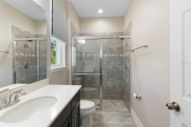 2337 Oxmoor Dr, Deland, FL 32724 - bathroom featuring vanity, toilet, a stall shower, and baseboards