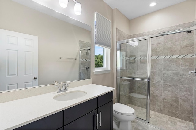 2337 Oxmoor Dr, Deland, FL 32724 - full bathroom featuring toilet, vanity, a stall shower, tile patterned flooring, and recessed lighting