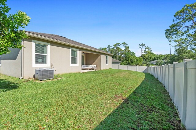 2337 Oxmoor Dr, Deland, FL 32724 - view of yard featuring central air condition unit