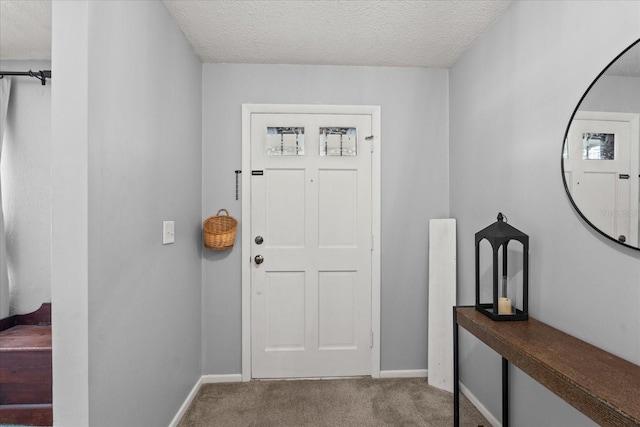 736 Lindenwood Cir W, Ormond Beach, FL 32174 - carpeted entrance foyer with a textured ceiling and baseboards