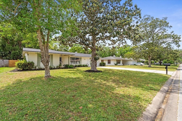 736 Lindenwood Cir W, Ormond Beach, FL 32174 - ranch-style home featuring concrete driveway