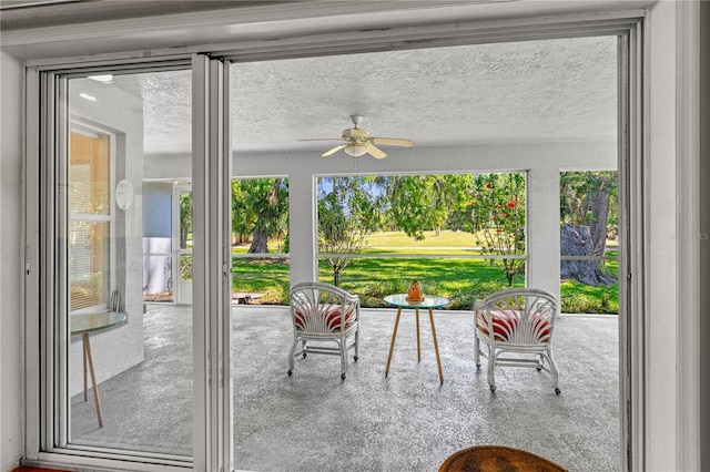 105 Riviera Estates Blvd, Ormond Beach, FL 32174 - doorway to outside featuring a ceiling fan