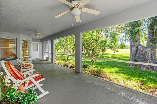 105 Riviera Estates Blvd, Ormond Beach, FL 32174 - unfurnished sunroom with ceiling fan