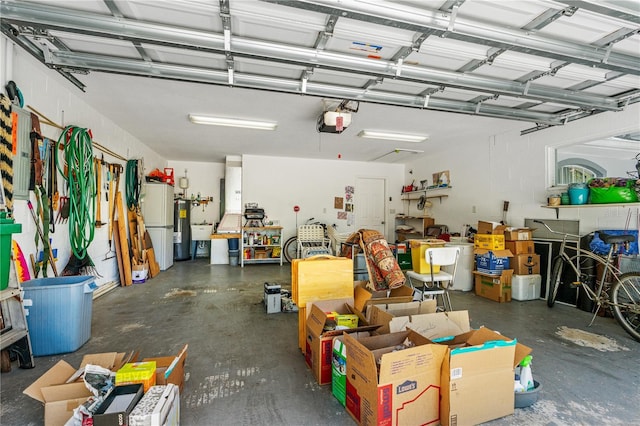 105 Riviera Estates Blvd, Ormond Beach, FL 32174 - garage with freestanding refrigerator and a garage door opener