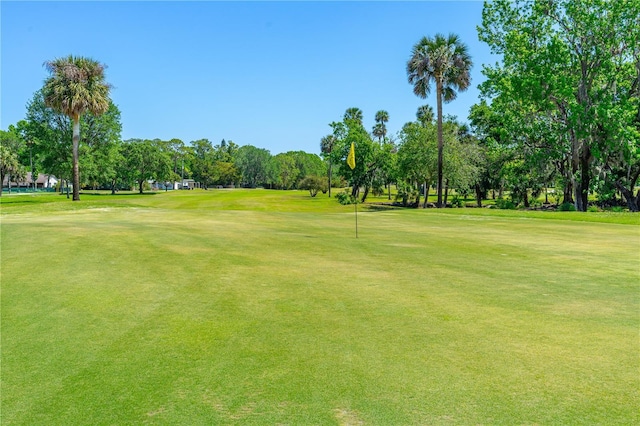 105 Riviera Estates Blvd, Ormond Beach, FL 32174 - view of community with a yard and golf course view