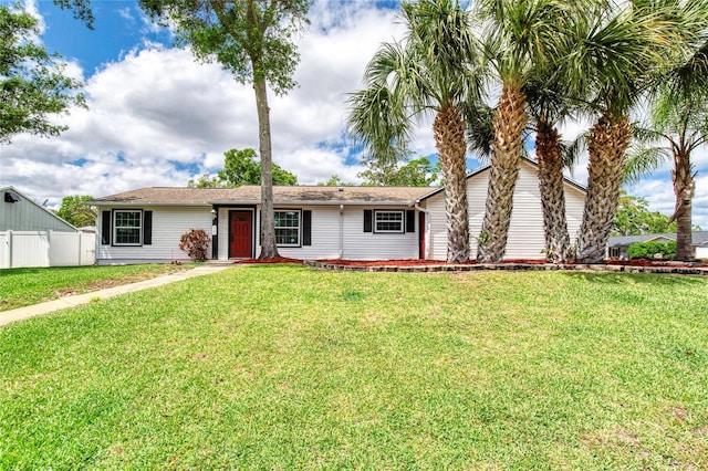 952 Northbrook Dr, Ormond Beach, FL 32174 - ranch-style house with fence and a front yard