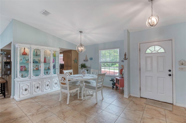 952 Northbrook Dr, Ormond Beach, FL 32174 - dining space featuring baseboards, a chandelier, visible vents, and light tile patterned floors