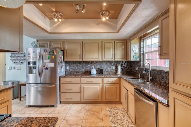 952 Northbrook Dr, Ormond Beach, FL 32174 - kitchen with a tray ceiling, a sink, dark stone counters, backsplash, and appliances with stainless steel finishes