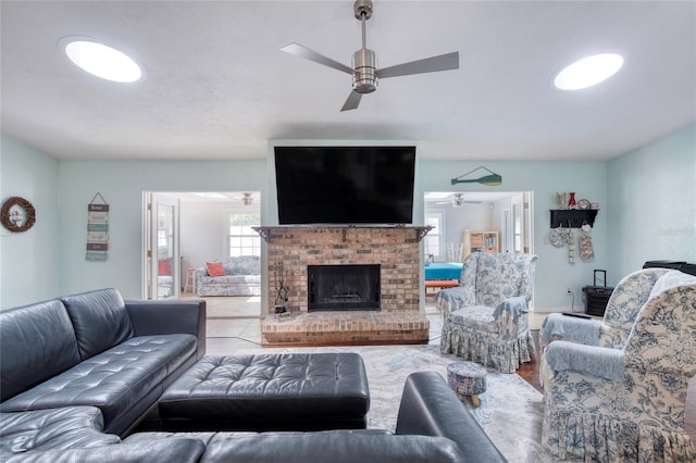 952 Northbrook Dr, Ormond Beach, FL 32174 - living area featuring a ceiling fan and a brick fireplace