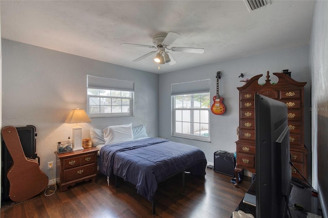 952 Northbrook Dr, Ormond Beach, FL 32174 - bedroom featuring wood finished floors, visible vents, a ceiling fan, and baseboards