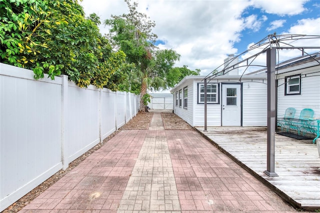 952 Northbrook Dr, Ormond Beach, FL 32174 - view of patio / terrace featuring a fenced backyard and a deck