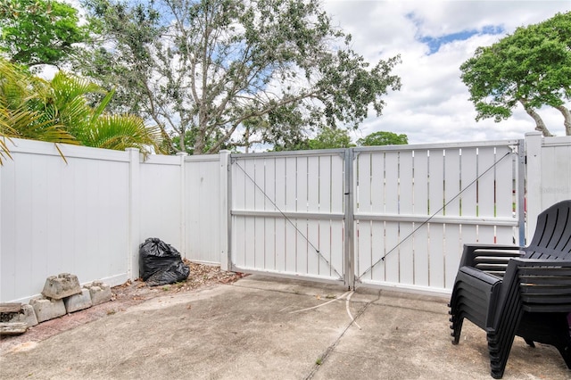 952 Northbrook Dr, Ormond Beach, FL 32174 - view of patio / terrace featuring fence and a gate