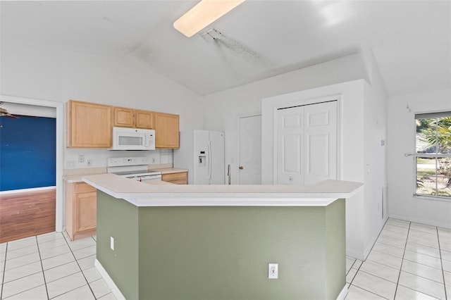 3214 Juniper Dr, Edgewater, FL 32141 - kitchen featuring vaulted ceiling, baseboards, white appliances, light countertops, and light tile patterned floors