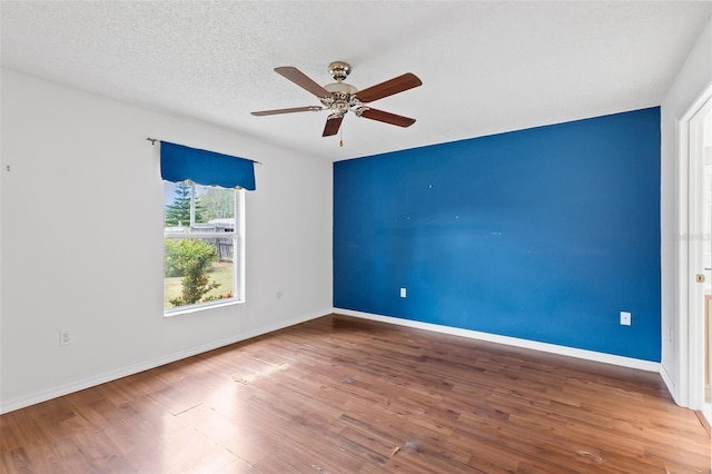 3214 Juniper Dr, Edgewater, FL 32141 - spare room featuring baseboards, a ceiling fan, and wood finished floors