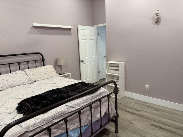 4749 Stoneview Cir, Oldsmar, FL 34677 - bedroom featuring wood finished floors and baseboards