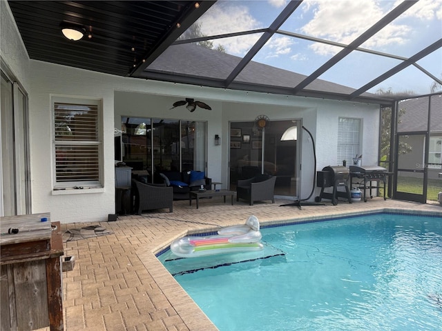 4749 Stoneview Cir, Oldsmar, FL 34677 - swimming pool featuring a patio area, a ceiling fan, a lanai, and an outdoor hangout area