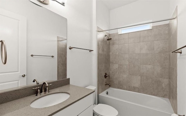 full bathroom with shower / bathtub combination, vanity, and toilet