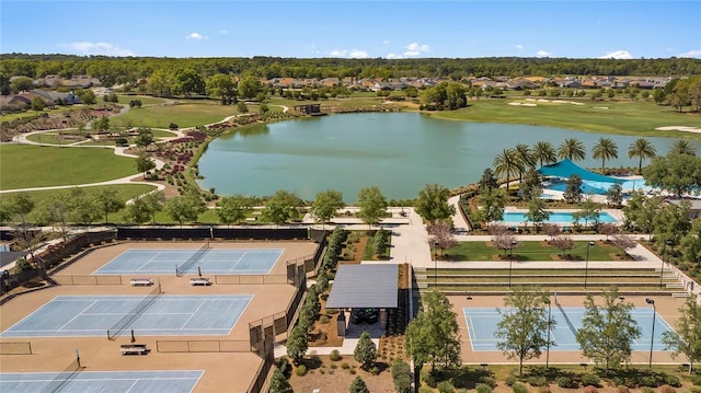 aerial view featuring a water view and golf course view