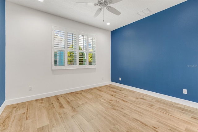 484 Landshark Blvd, Daytona Beach, FL 32124 - unfurnished room featuring visible vents, a ceiling fan, baseboards, and wood finished floors