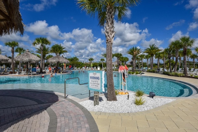484 Landshark Blvd, Daytona Beach, FL 32124 - community pool with a gazebo and a patio area