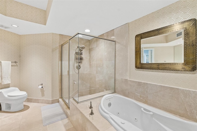 241 Riverside Dr Unit 902, Holly Hill, FL 32117 - bathroom with toilet, a tub with jets, wallpapered walls, and a stall shower