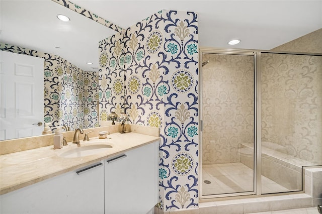241 Riverside Dr Unit 902, Holly Hill, FL 32117 - bathroom with vanity, recessed lighting, and a stall shower