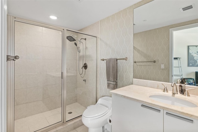 241 Riverside Dr Unit 902, Holly Hill, FL 32117 - bathroom featuring wallpapered walls, visible vents, toilet, and a stall shower