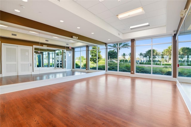 241 Riverside Dr Unit 902, Holly Hill, FL 32117 - exercise room with wood finished floors and visible vents