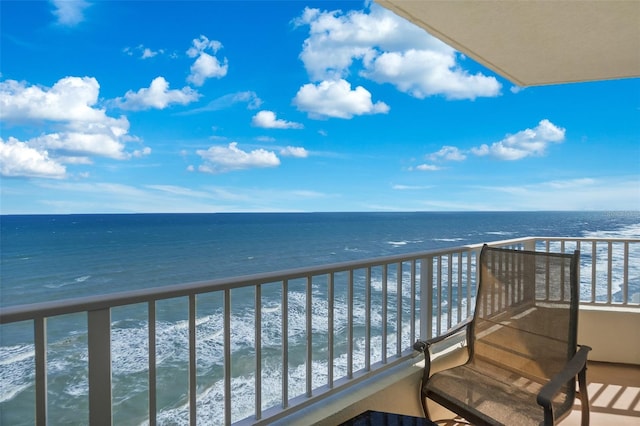 balcony featuring a water view