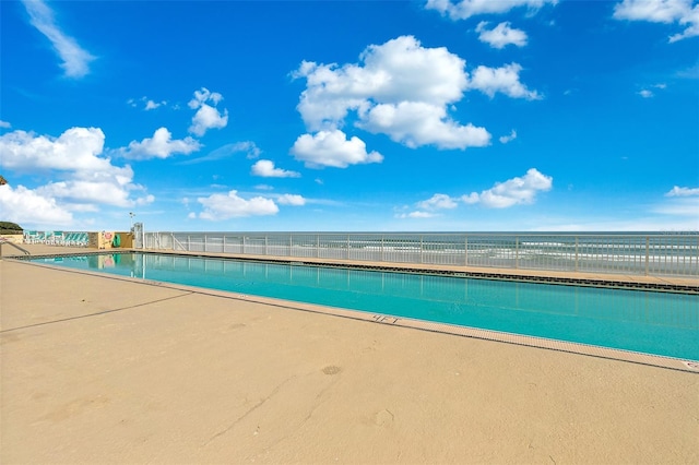 pool with a patio