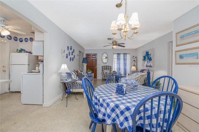 1148 Briarwood Ave, Deltona, FL 32725 - dining room with ceiling fan with notable chandelier, baseboards, and visible vents