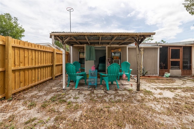 1148 Briarwood Ave, Deltona, FL 32725 - exterior space with a sunroom and a fenced backyard