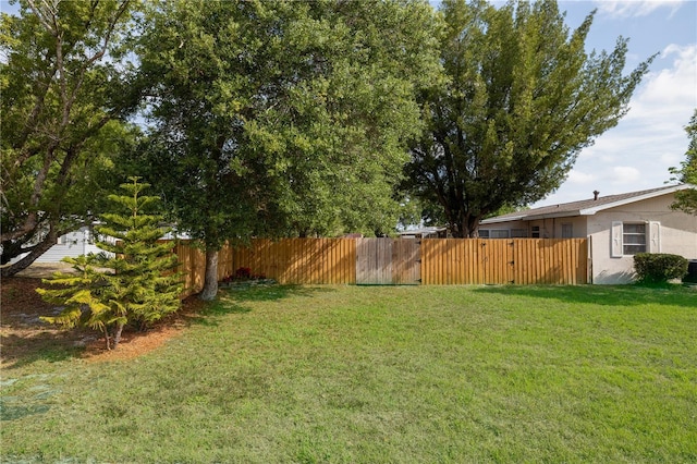 1148 Briarwood Ave, Deltona, FL 32725 - view of yard with a gate and fence