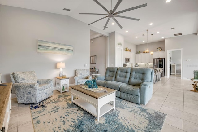 660 Mosaic Blvd, Daytona Beach, FL 32124 - living room featuring light tile patterned floors, ceiling fan, lofted ceiling, recessed lighting, and baseboards
