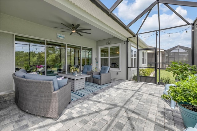 660 Mosaic Blvd, Daytona Beach, FL 32124 - view of patio / terrace with a ceiling fan, outdoor lounge area, and glass enclosure